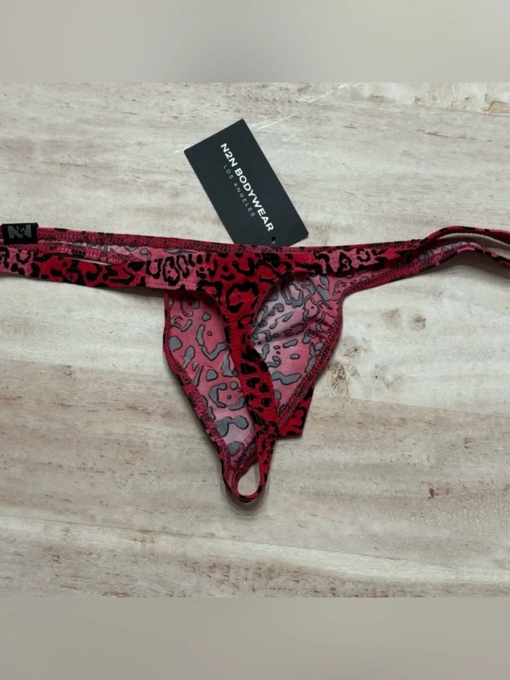 N2N BODYWEAR Wild One Animal Print Micro Thong Swimsuit